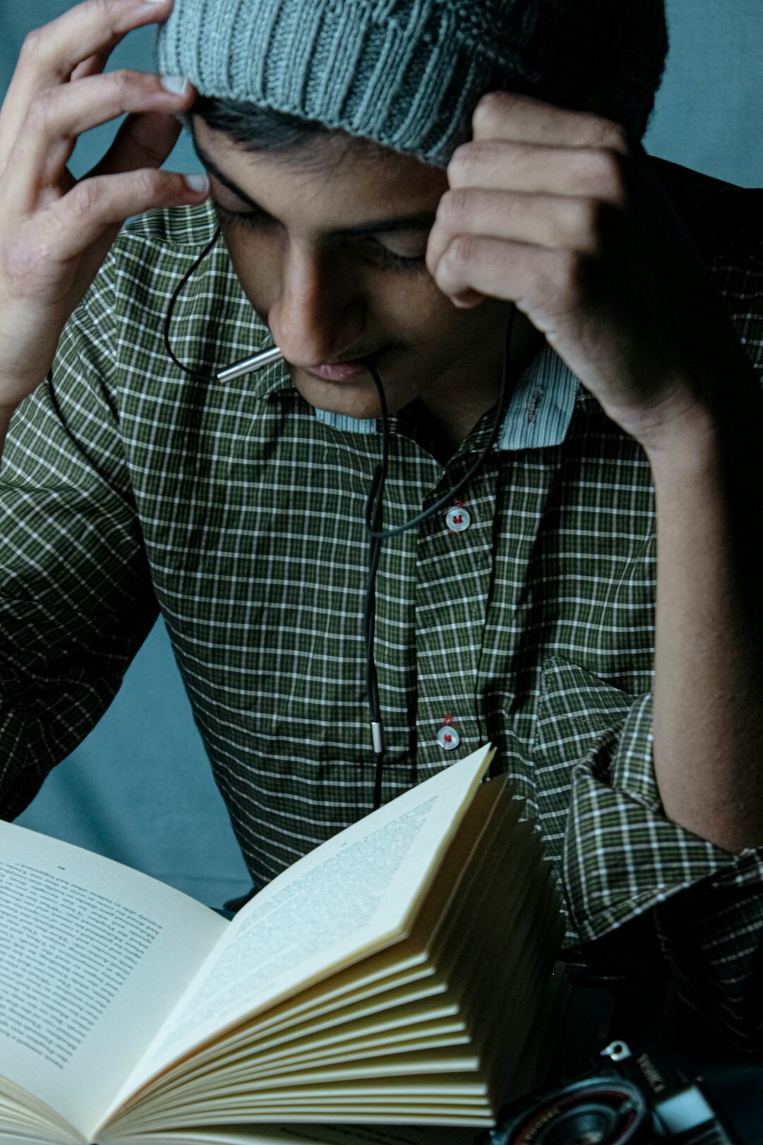 detective reading mystery book